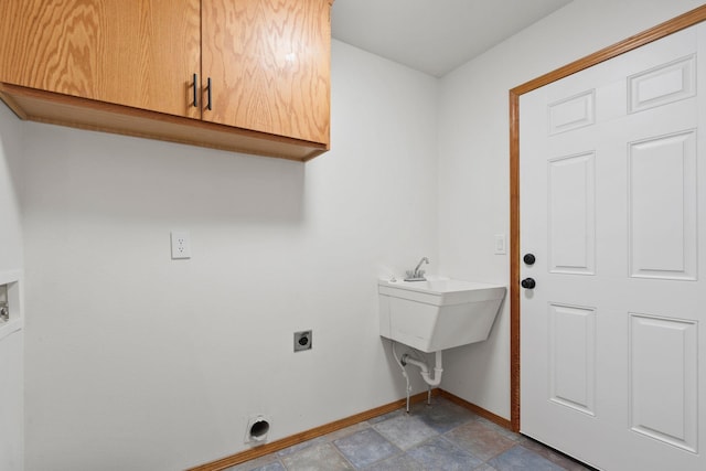 washroom with cabinets and hookup for an electric dryer