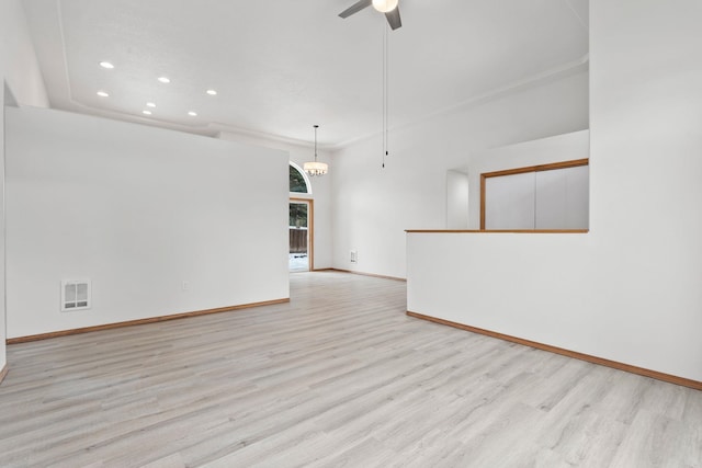 spare room with light hardwood / wood-style floors and ceiling fan