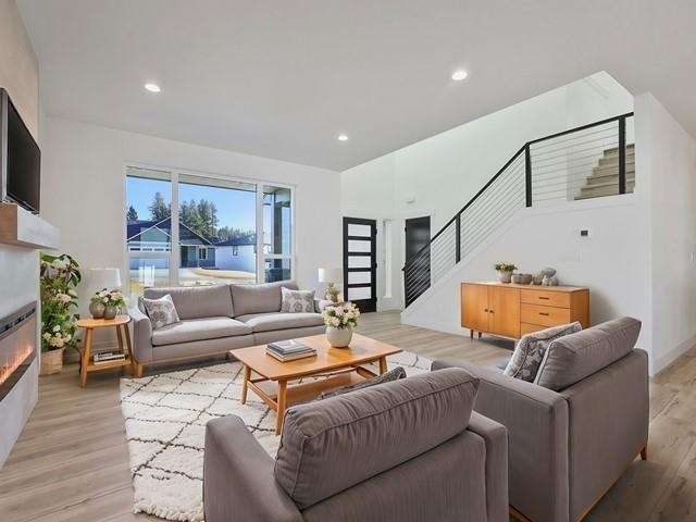 living room featuring light wood-type flooring