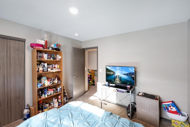 bedroom with light carpet