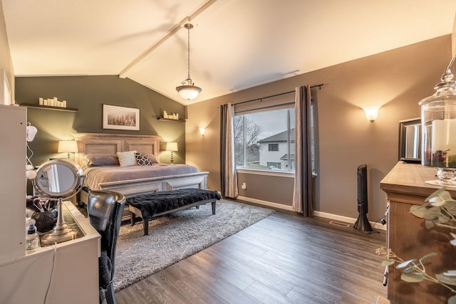 bedroom featuring vaulted ceiling and dark hardwood / wood-style floors