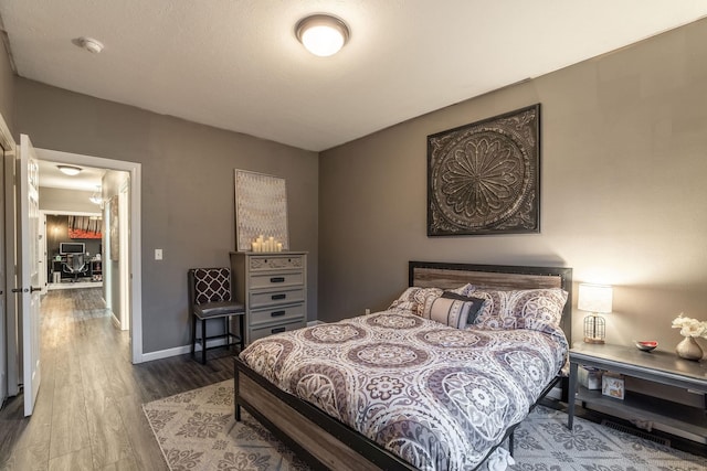 bedroom featuring hardwood / wood-style flooring