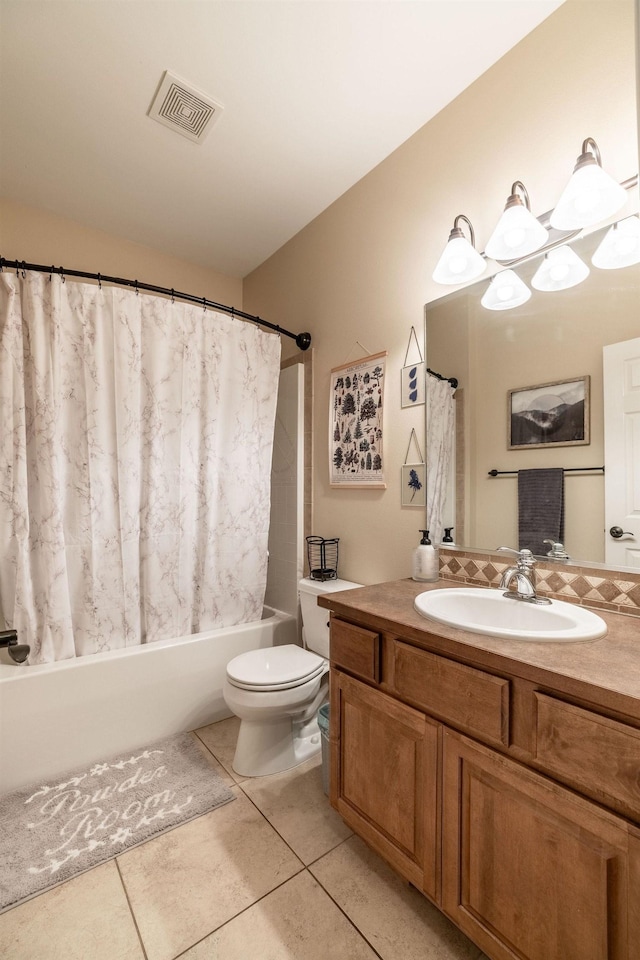 full bathroom featuring tile patterned floors, vanity, toilet, and shower / bath combo