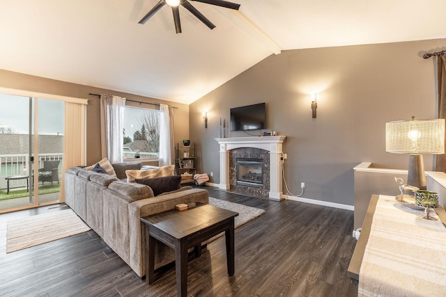 living room with lofted ceiling with beams, dark wood-type flooring, and ceiling fan