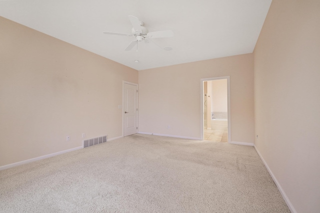 unfurnished room featuring carpet flooring and ceiling fan