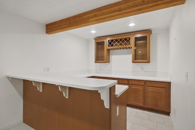 bar featuring beam ceiling