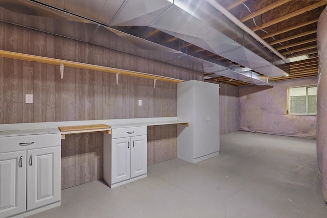 basement with wood walls