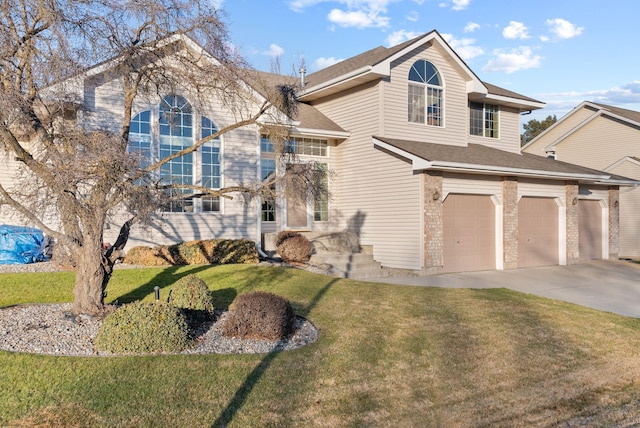 front of property with a garage and a front yard