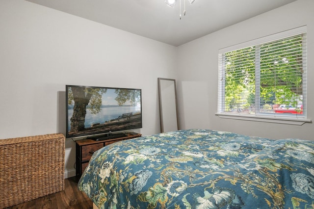 bedroom featuring dark hardwood / wood-style floors