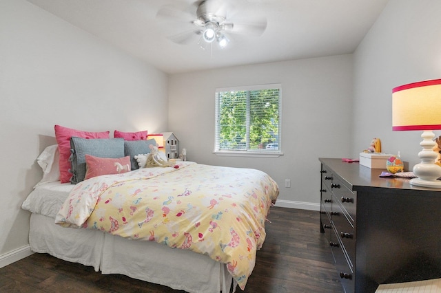 bedroom featuring dark hardwood / wood-style flooring and ceiling fan