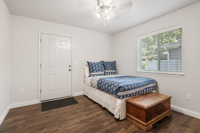 bedroom featuring dark wood-type flooring and ceiling fan