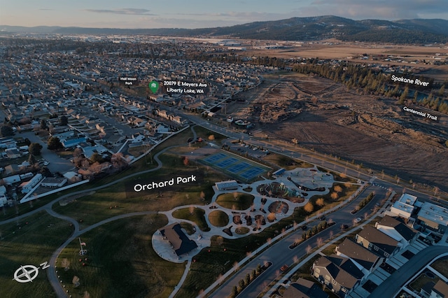 aerial view at dusk with a mountain view