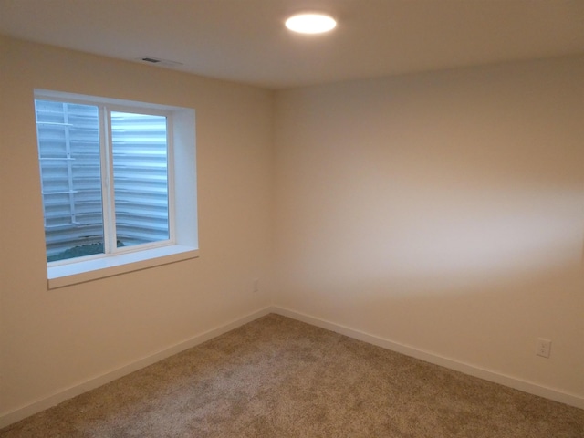 empty room with carpet floors