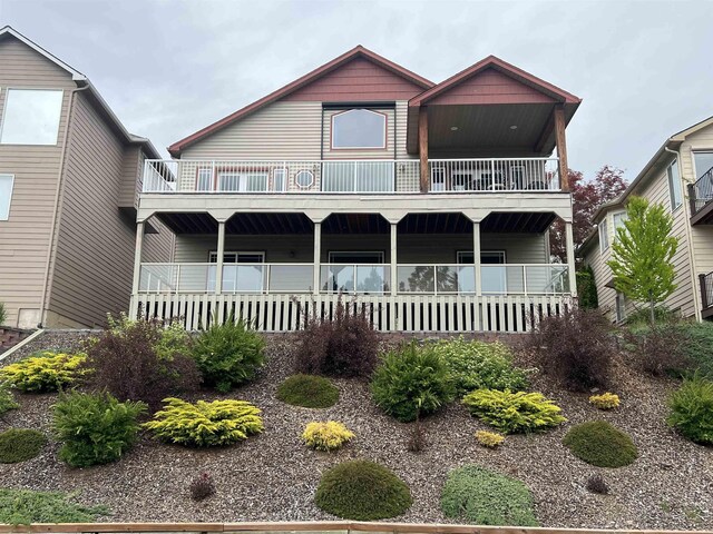 8518 E Sandlewood Ln, Spokane, WA 99217 - view of front of home featuring a balcony and covered porch