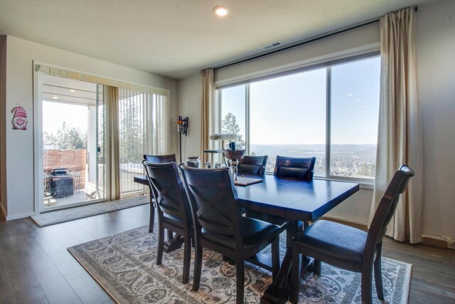 dining area featuring hardwood / wood-style flooring