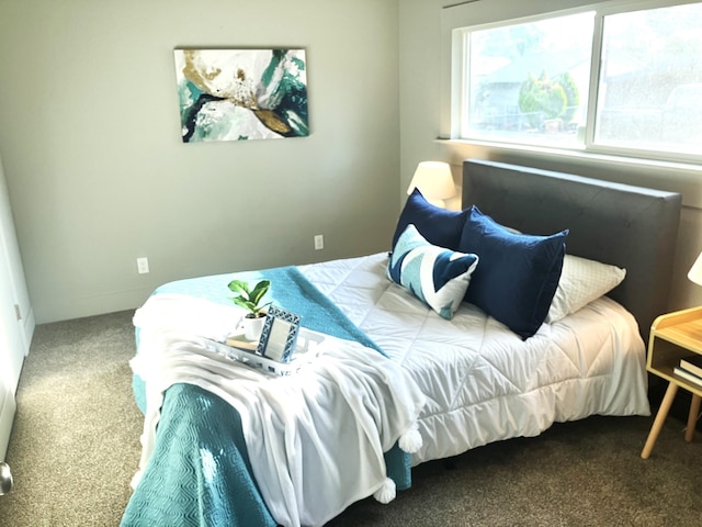 bedroom featuring carpet flooring