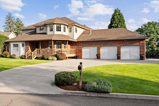 view of front facade with a garage, covered porch, and a front lawn