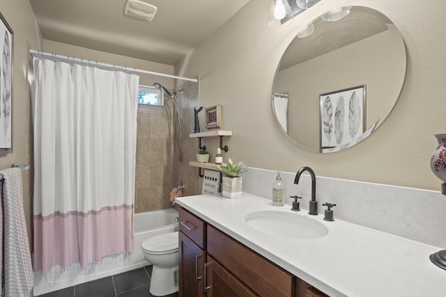 full bathroom with visible vents, toilet, shower / tub combo, vanity, and tile patterned flooring