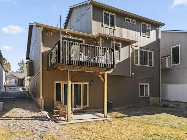 back of property with a patio area