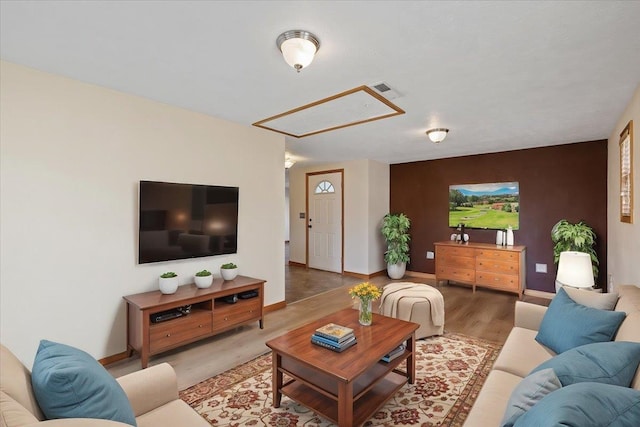 living room with hardwood / wood-style flooring