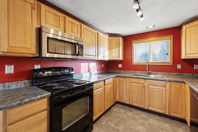 kitchen with sink, a textured ceiling, and black / electric stove