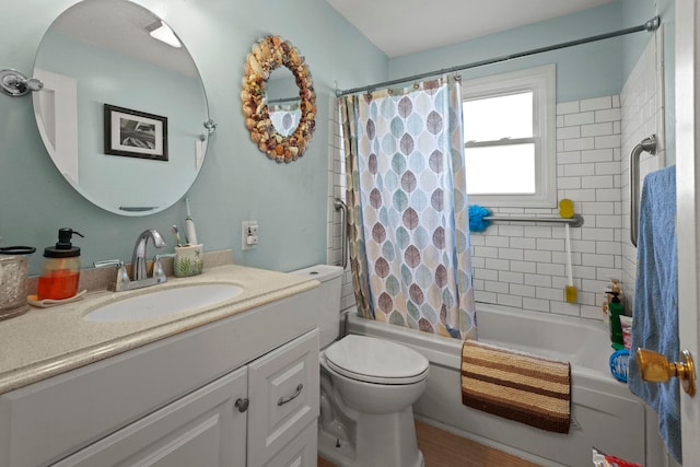 full bathroom featuring vanity, shower / bathtub combination with curtain, and toilet