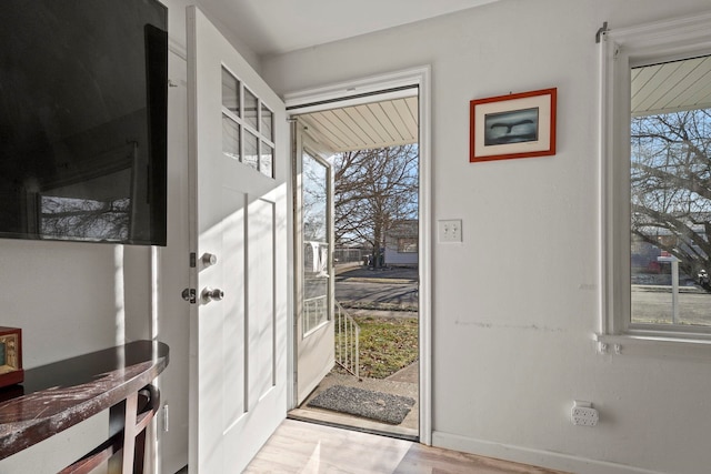 doorway to outside featuring light hardwood / wood-style floors