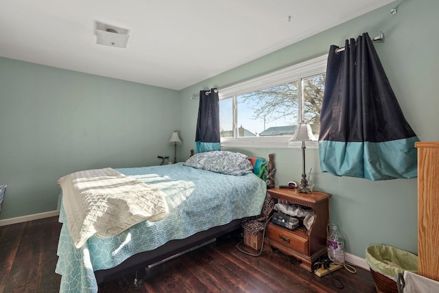 bedroom featuring dark hardwood / wood-style flooring