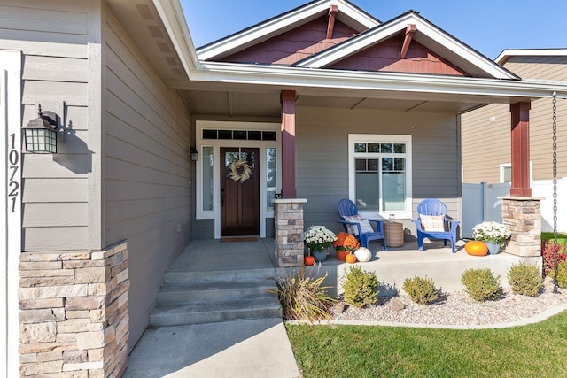 entrance to property with covered porch