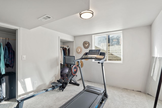 workout area with light colored carpet