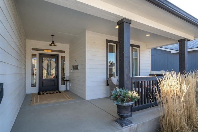 doorway to property featuring a porch