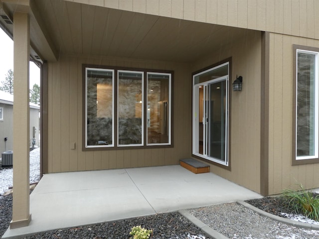 doorway to property with a patio area