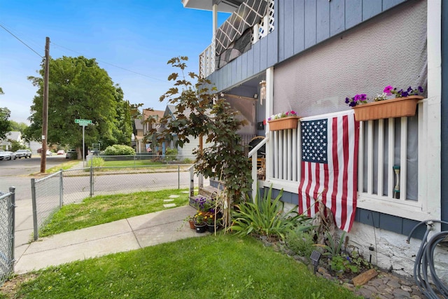 view of home's exterior with a lawn