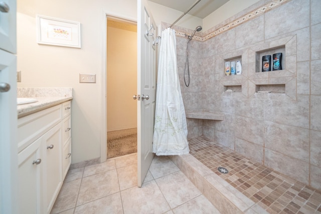3732 E Westwood Ave, Chattaroy, WA 99003 - full bath featuring a tile shower, tile patterned floors, and vanity