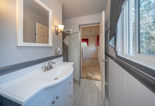 3732 E Westwood Ave, Chattaroy, WA 99003 - bathroom with vanity and a wealth of natural light