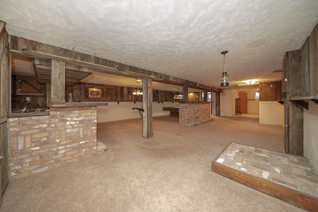 3732 E Westwood Ave, Chattaroy, WA 99003 - finished below grade area with a dry bar, a textured ceiling, and carpet