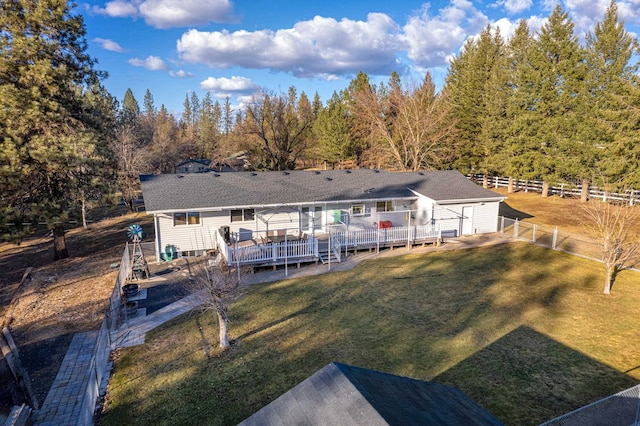3732 E Westwood Ave, Chattaroy, WA 99003 - back of property featuring a yard, an outbuilding, a wooden deck, and fence