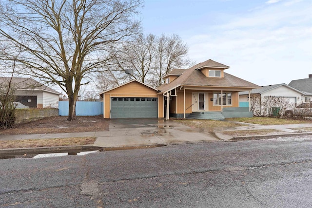 view of front of home featuring a garage and a porch