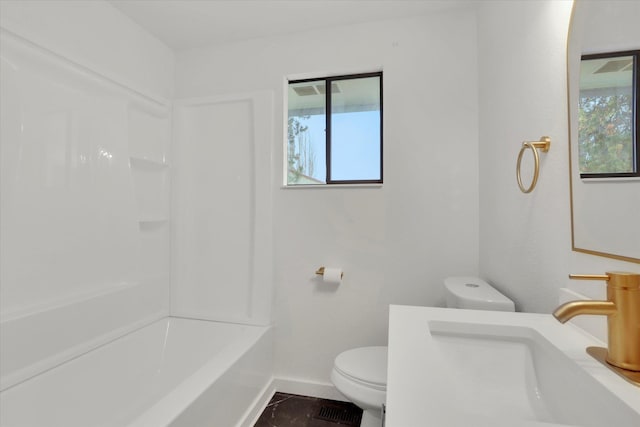 full bathroom with shower / washtub combination, toilet, and sink