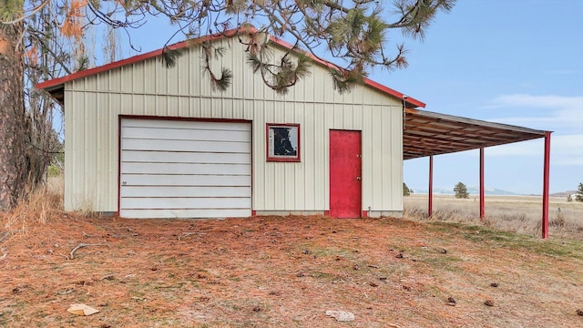 view of outbuilding with a garage