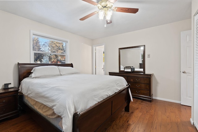 bedroom featuring hardwood / wood-style flooring and ceiling fan