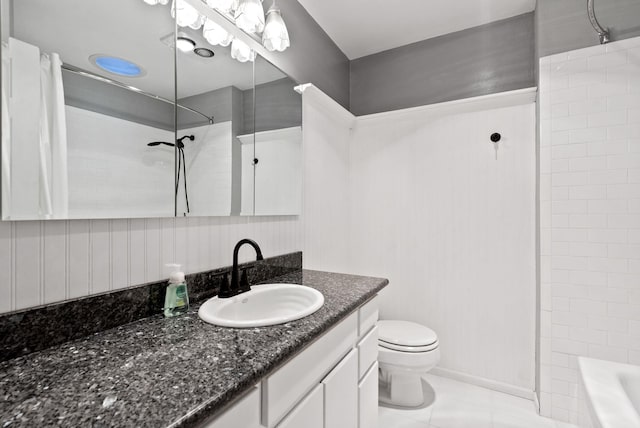 full bathroom with vanity, tiled shower / bath, tile patterned flooring, and toilet