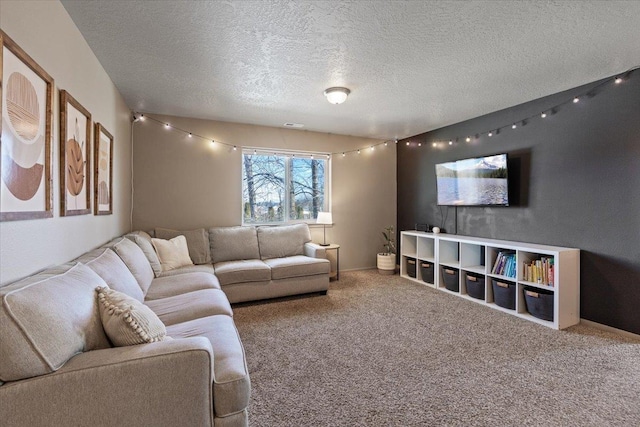 living room with carpet floors and a textured ceiling