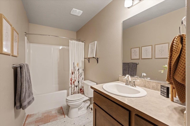 full bathroom featuring vanity, toilet, shower / tub combo, and a textured ceiling