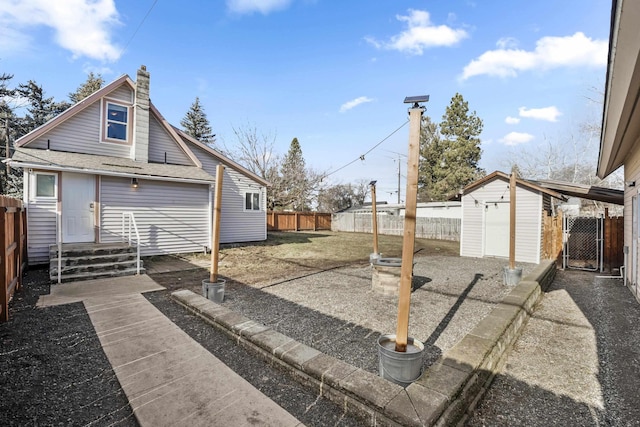 exterior space with a storage shed