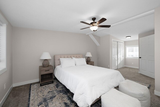 carpeted bedroom featuring ensuite bathroom and ceiling fan