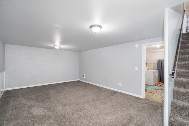 basement with dark carpet