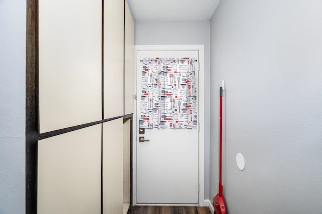12409 E Olive Ave, Spokane Valley, WA 99216 - entryway with wood finished floors and a textured ceiling