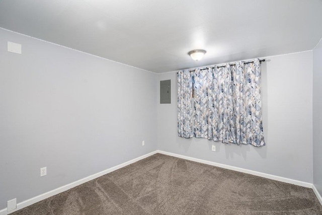 12409 E Olive Ave, Spokane Valley, WA 99216 - empty room featuring electric panel, carpet flooring, and baseboards