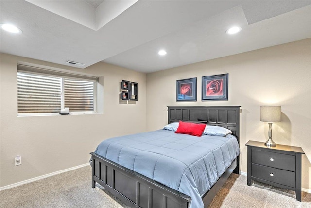 bedroom featuring light carpet